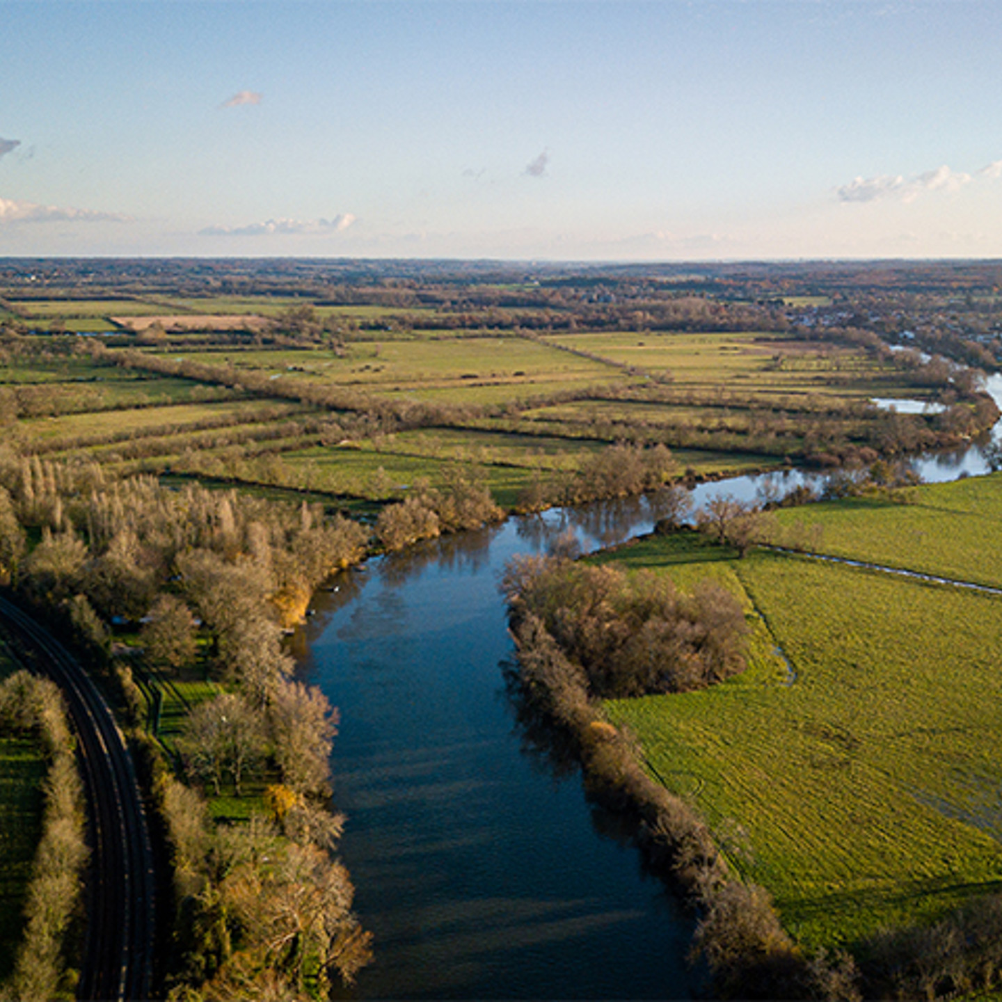 Image of a river through fields